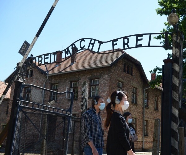 visitors at the memorial site of auschwitz