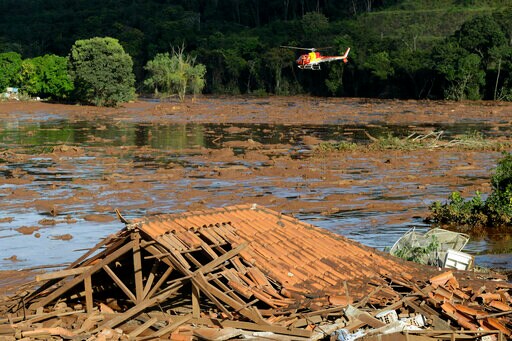Firefighters Search Mud after Brazil Dam Collapse; 58 Dead