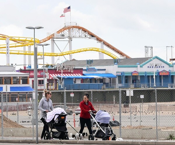 the santa monica pier is empty in the background