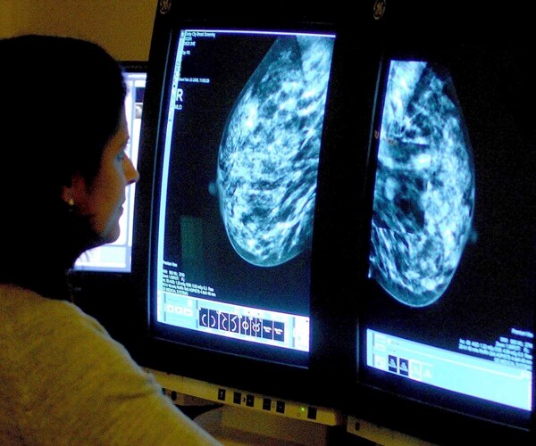 Drug Cuts Breast Cancer Return in Half