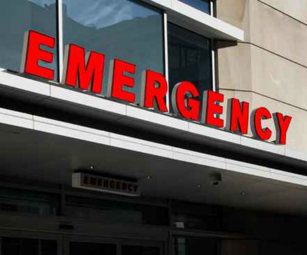 graphic shows emergency sign in front of hospital