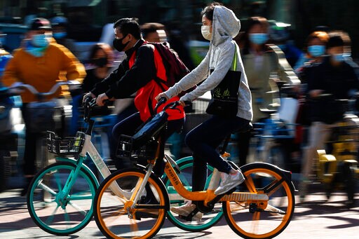 Asia Today: China to Test 9 Million after Fresh Outbreak