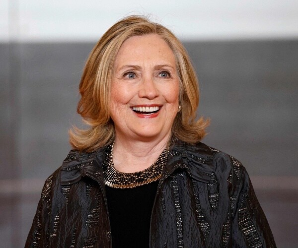 hilary clinton arrives at summit