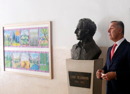 The Latest: Fearing Attacks, Montenegro Arrests 20 Serbs