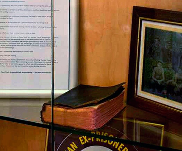 a Bible is displayed on the missing man table at the Manchester VA Medical Center