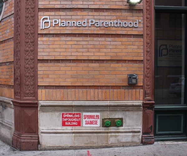 planned parenthood sign on the side of a new york building