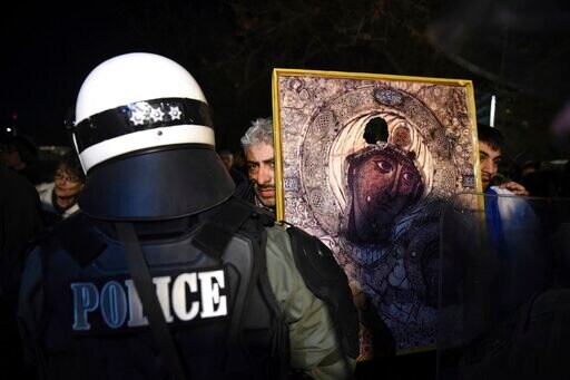 Greek President, Jeered by Name Deal Foes, Denounces Nazism