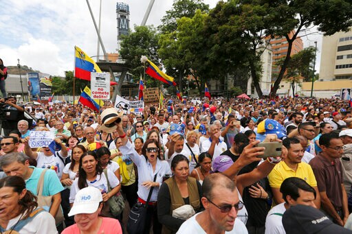 The Latest: Guaidó Asks for Relations with US Military