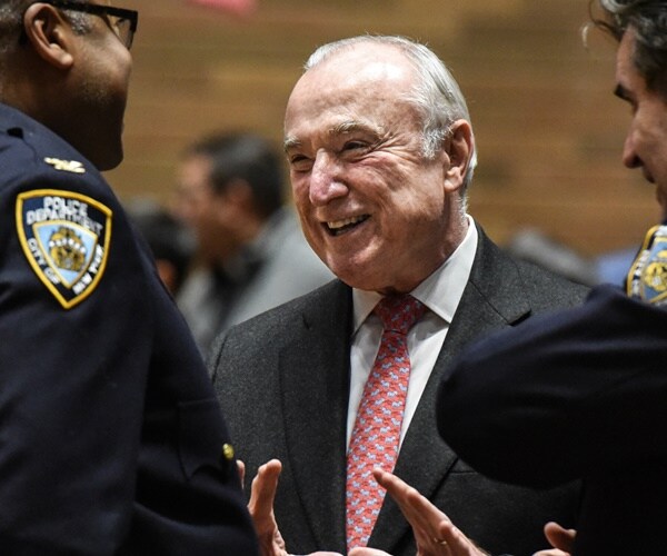 bill bratton speaks with captains during a searing in ceremony