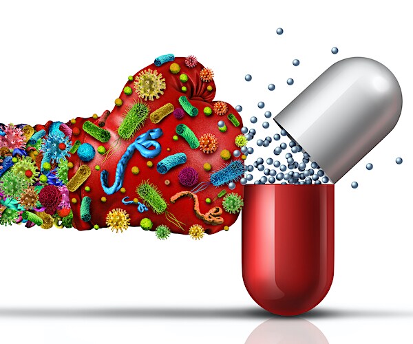 Antibiotic resistant germs as virus or bacteria cells as a deadly mutated viral disease attacking a pill with a punch