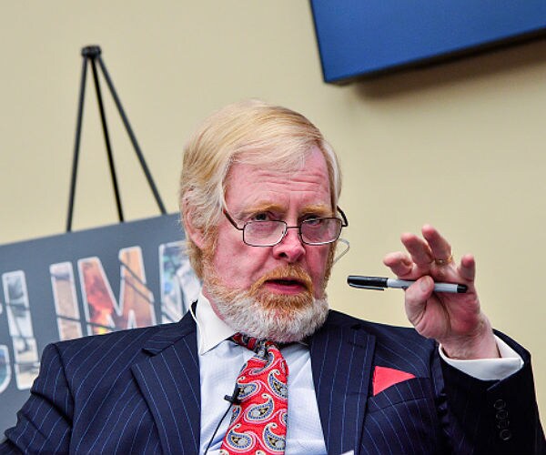 brent bozell speaks to a group on climate