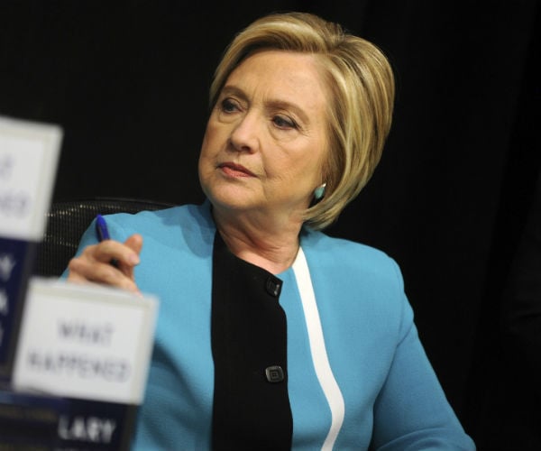 Clinton Mocks 'Manspreading' Putin