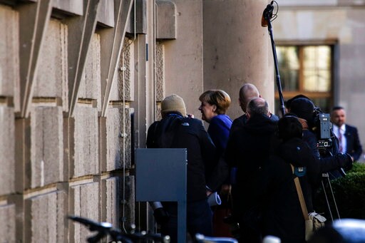 German Coalition Negotiator Urges Calmer Approach