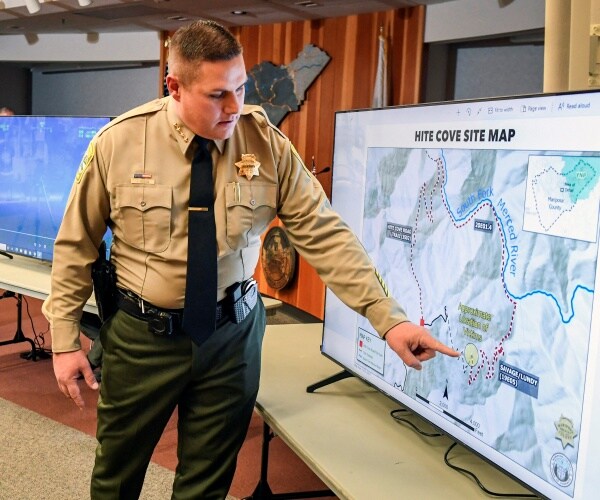 Mariposa County Sheriff Jeremy Briese points to a map