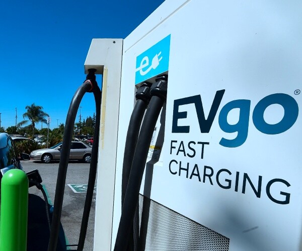 evgo charging station is shown with a wires plugged into a car