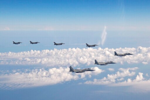 Japan, US Fly Fighters after China Drill, N. Korean Missiles