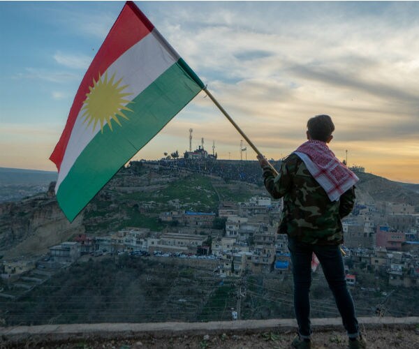kurdish flag at sunset 