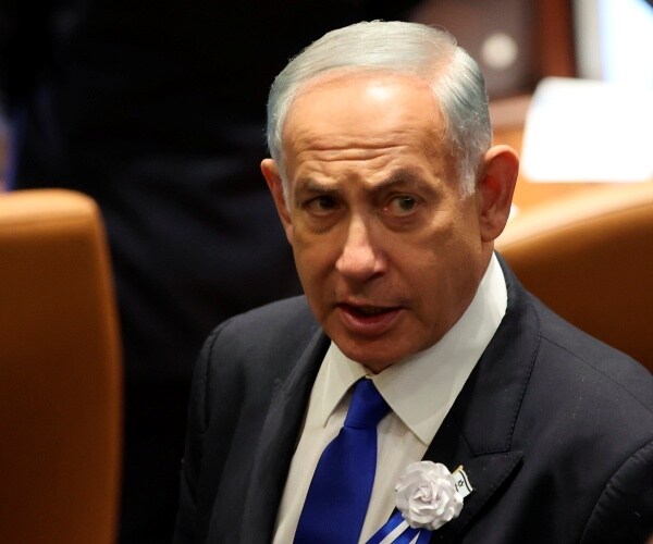 benjamin netanyahu looks on