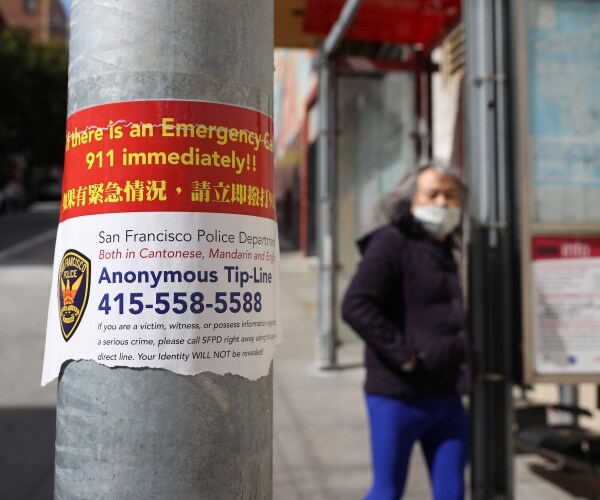 Elderly Asian Woman Beats Up Young Attacker