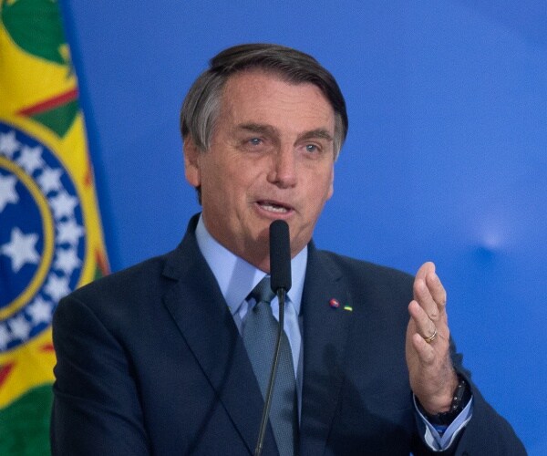 jair bolsonaro speaks to press