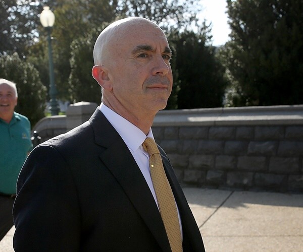 steve linick walks into a hearing