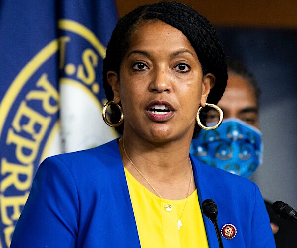 jahana hayes stands and speaks during a news conference