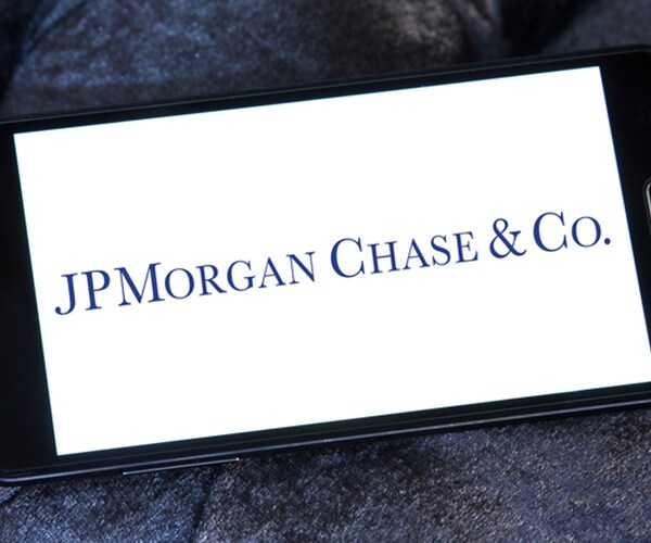 JPMorgan Profit Plunges 37 Percent on Tax Hit