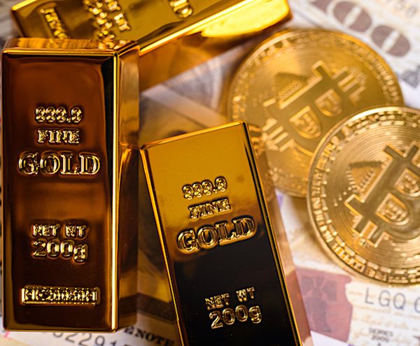 gold bars and fake bitcoins in gold