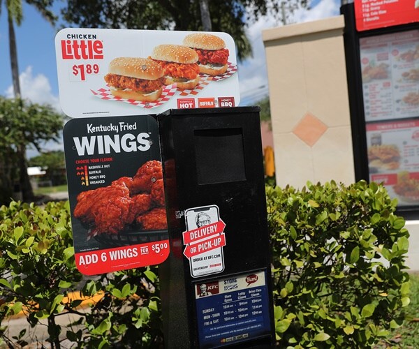 a drive-thru sign at a kfc