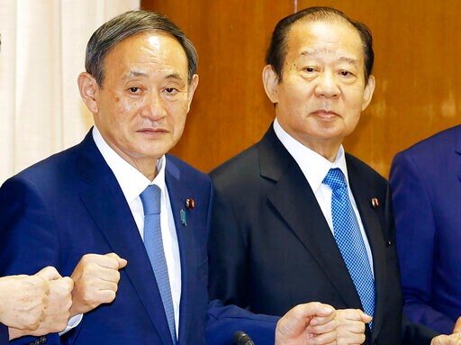 Japan Virus Outbreaks, Scandals Sap Public Support for Suga