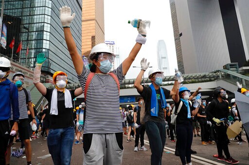 AP Photos: Hong Kong Activists Vow to Keep up Pressure