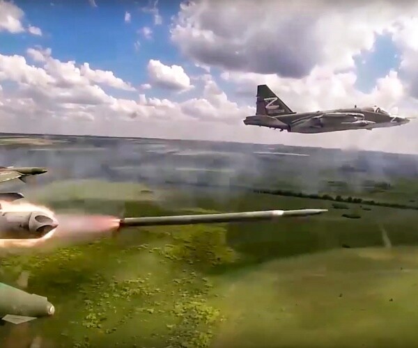 a russian attack jet fires rockets