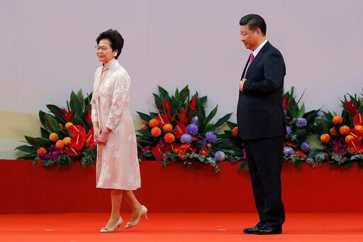 Analysis: China Blinks on Hong Kong, but Divide Remains