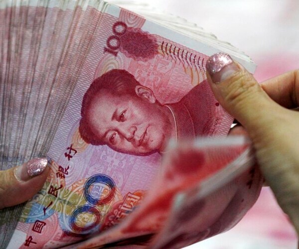 China Scales Back Measures Propping Up Its Currency 