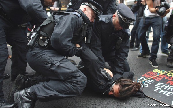 British Police Scuffle With G-8 Protesters