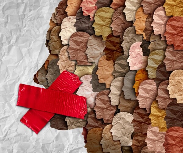 crowd of people silenced with a red x