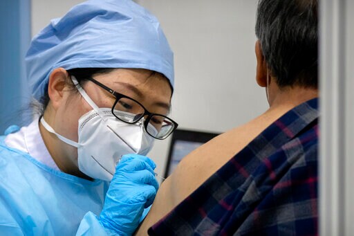 Beijing Appears to Retract Vaccine Mandate after Pushback