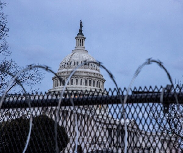 barbed wire in front of the capitol building