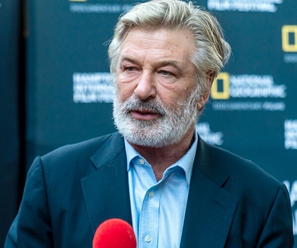 alec baldwin speaks to reporter on red carpet