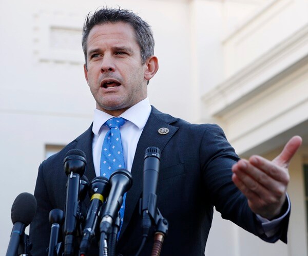 rep adam kinzinger speaks with the media