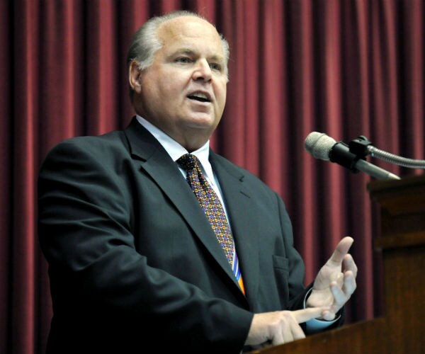rush limbaugh speaking during a ceremony 