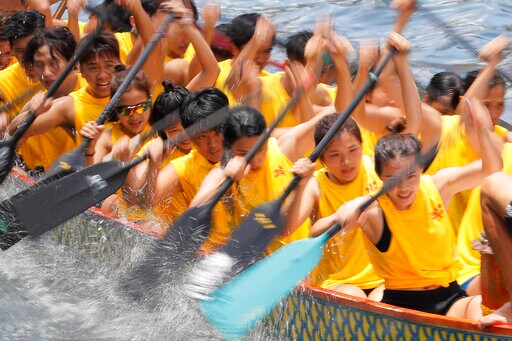 Chinese Take to the Seas in Annual Dragon Boat Races