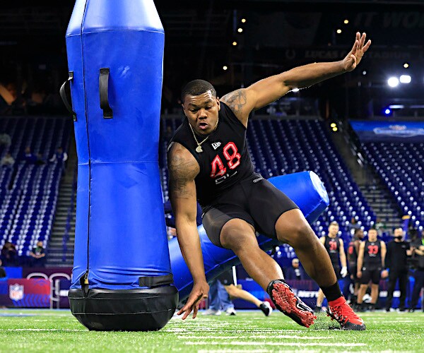 Travon Walker of Georgia runs a drill during the NFL Combine at Lucas Oil Stadium