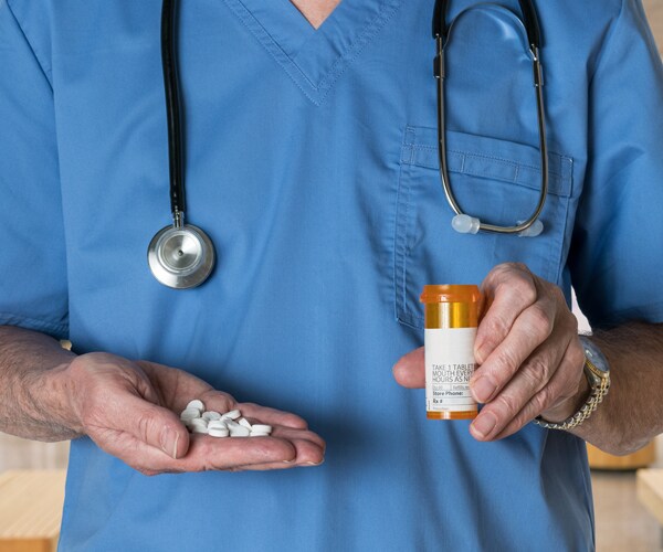 a doctor holding medicine
