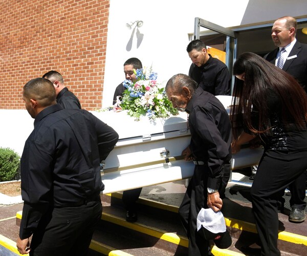 Kids Die Side-by-Side in Car Seats, Buried in Same Coffin