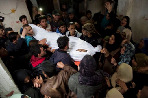 The Latest: Gaza Demonstrators Gather for Anniversary March