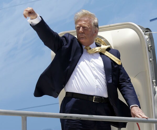 president donald trump boarding air force one
