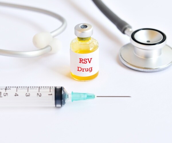 vial of RSV antibody, syringe, stethoscope