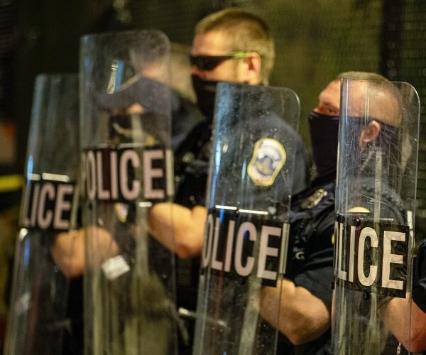 Washington DC Police clear protesters 
