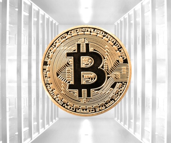 gold coin of bitcoin currency is shown